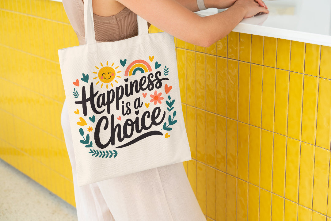 Canvas tote bag with a cheerful design and the quote 'Happiness is a Choice' in bold letters